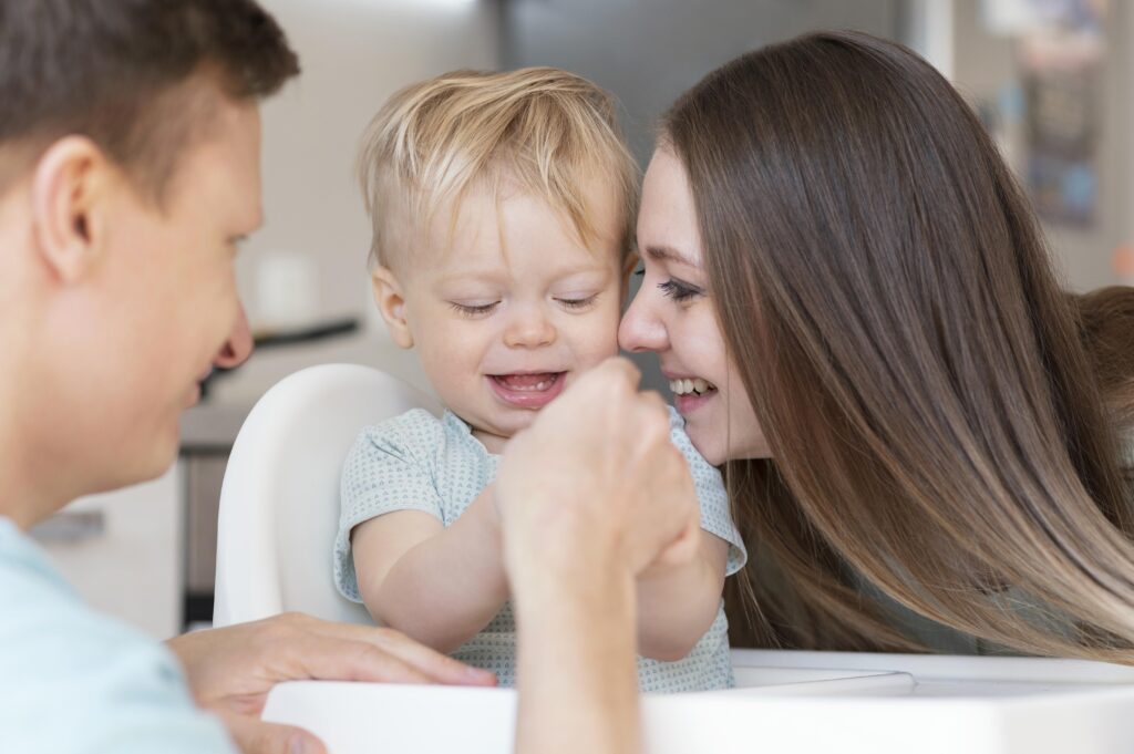 close-up-happy-parents-with-toddler