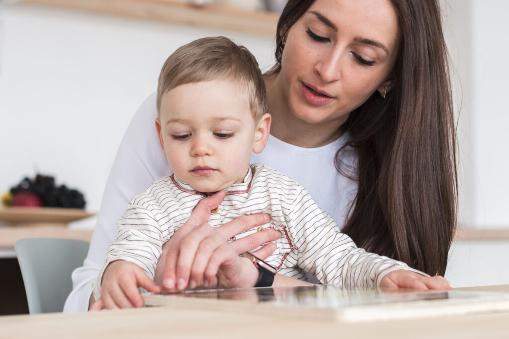 front-view-mother-with-child-kitchen