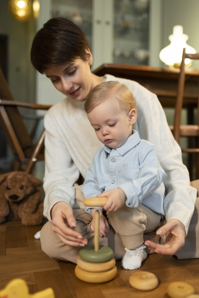 medium-shot-mother-holding-cute-baby