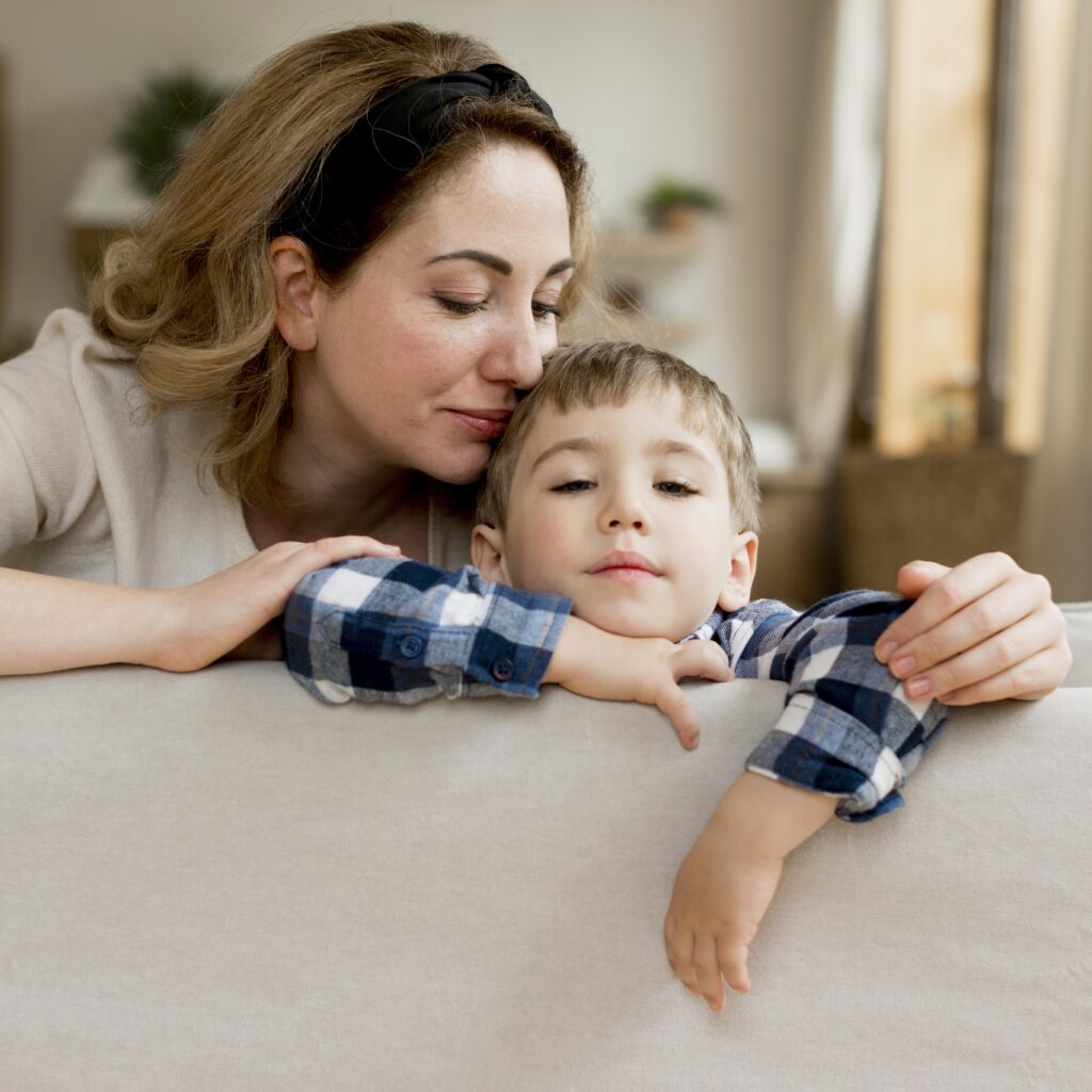 mother-hugging-her-cute-boy
